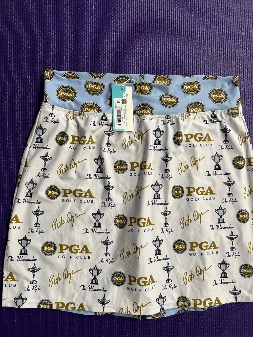 PGA Tour White Skort with Light Blue Waistband and Gold Logo Print